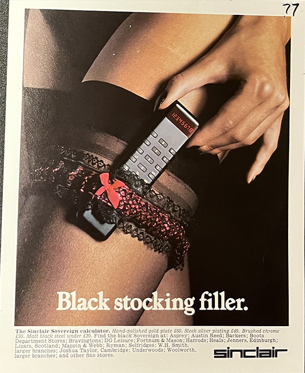 An advertisement for a Sinclair Sovereign Calculator featuring a women putting a thin black calculator into a garter on her leg. The caption reads Black stocking filler.