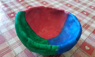 Red, blue and green clay pinch pot