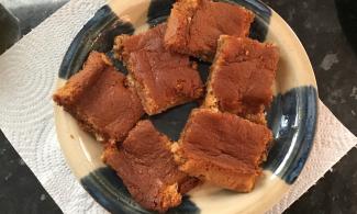 Finished product of Roman-inspired honey cake, cut up into squares