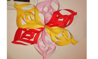 Yellow, pink and red decorative paper star