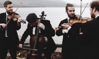 Maxwell quartet playing violins 