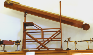 Wooden telescope mounted on a frame