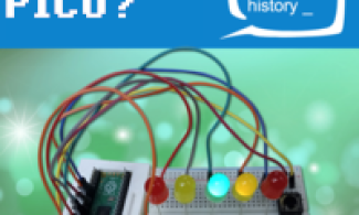 Circuit board with coloured lights attached to a by wires to a Rasberry Pi Pico