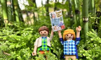 Image of two toys completing a summer trail at the Botanic Garden