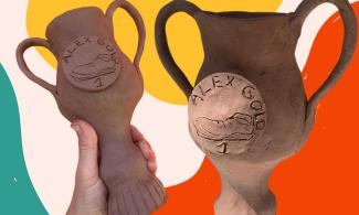 Two clay trophies.
