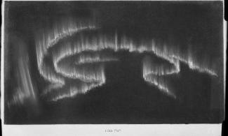 A black and white photograph of a painting of the Northern Lights, painted on wood and displaying an aurora that is swirling in the centre of the frame. 