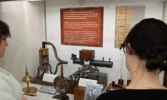 Image from an our new exhibition: The Cavendish Laboratory and the Birth of the Atomic Age. Main object in focus is the Kew Magnetometer.