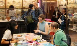 Visitors engaged in craft-making at the Fitzwilliam Museum 