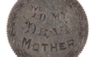 War craft banner showing a French silver franc, smoothed, pierced and decorated with a border on the obverse, and engraved ‘To my dear mother