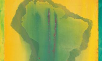 Detail of Frank Bowling's 'Yellow Map' - vividly coloured paint depicting abstract image of Africa in bright yellow background and green showing the land. 