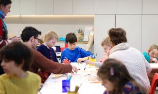 Children & families taking part in a creative workshop at Kettle’s Yard.