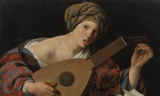 Young woman playing a lute