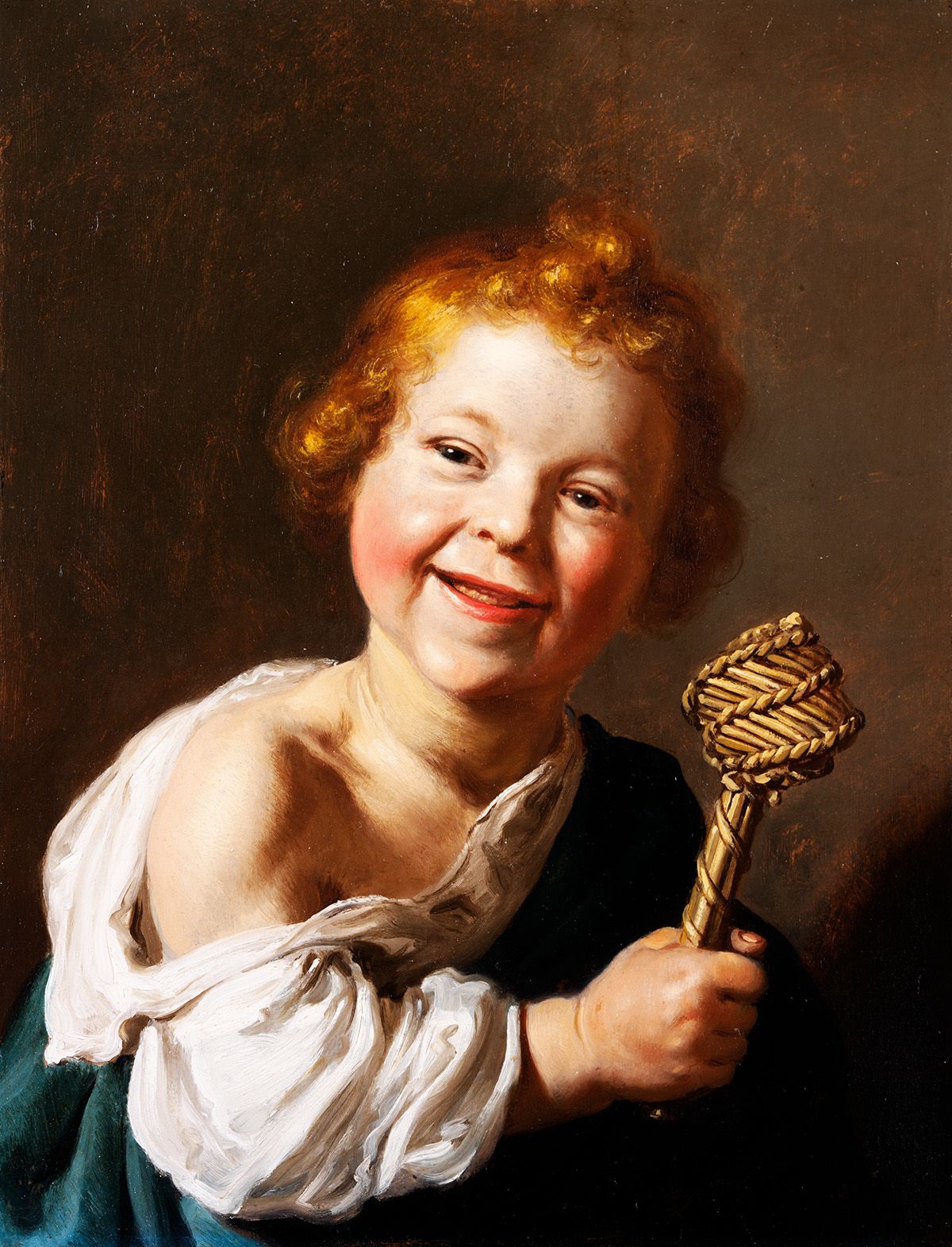 Photo of an oil painting of a child, laughing, holding a wicker rattle. He has loose ginger curls and rosy cheeks, with a white shirt slipping faroff his shoulder and a blue overshirt visible. The background is a mid brown.