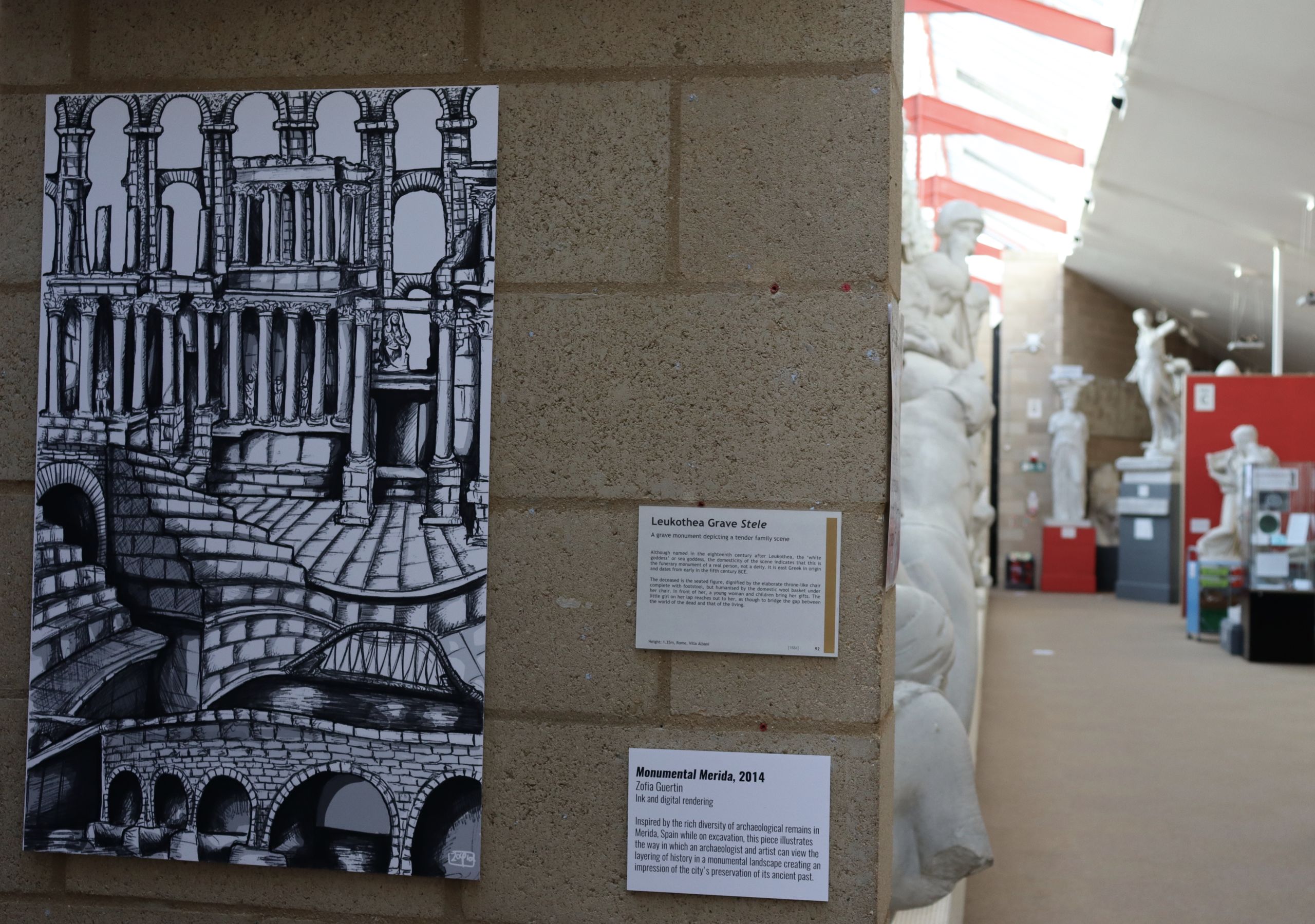 Photograph of the artwork 'Monumental Merida' with a row of casts in the background..