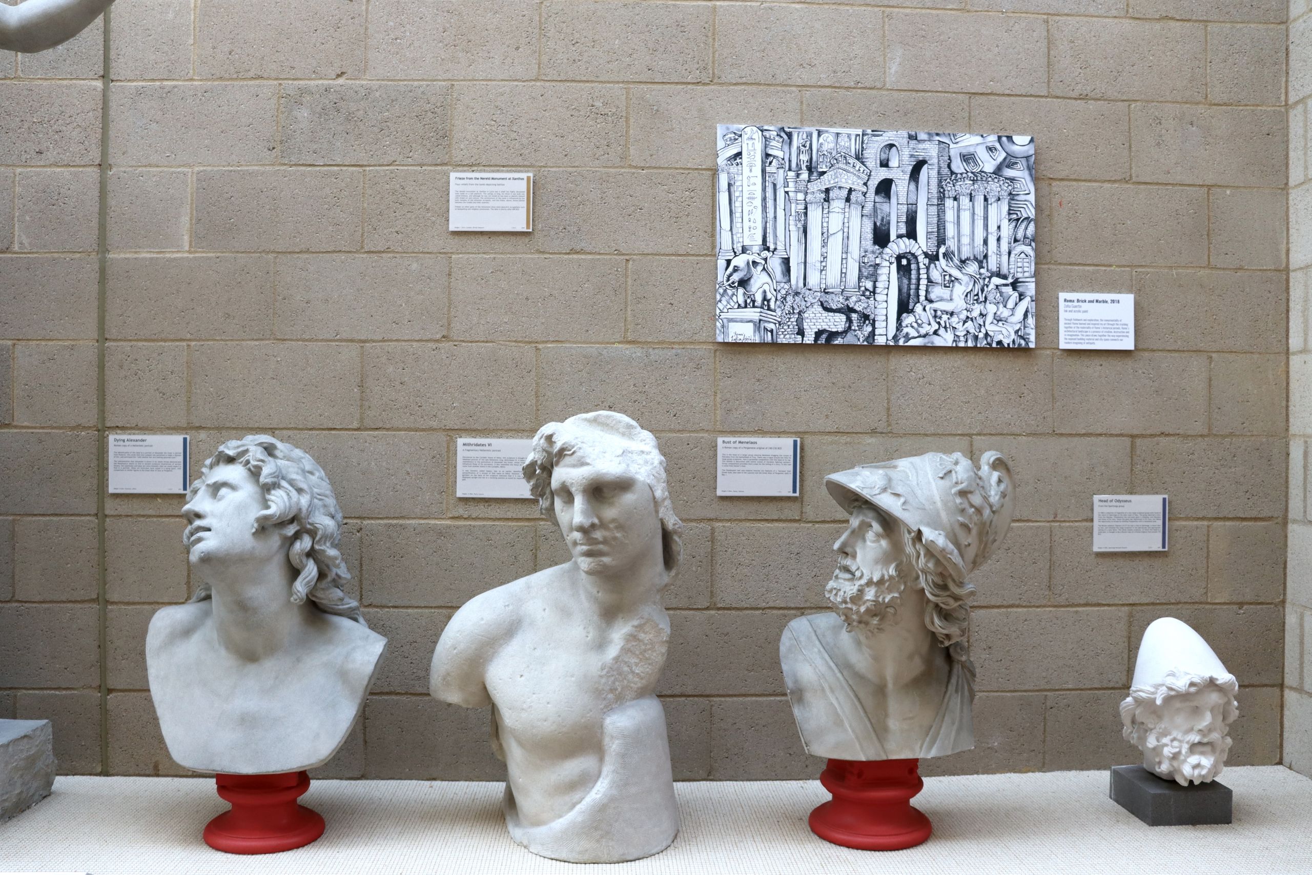 Photograph of the artwork 'Rome: Brick and Marble' positioned above a row of busts.