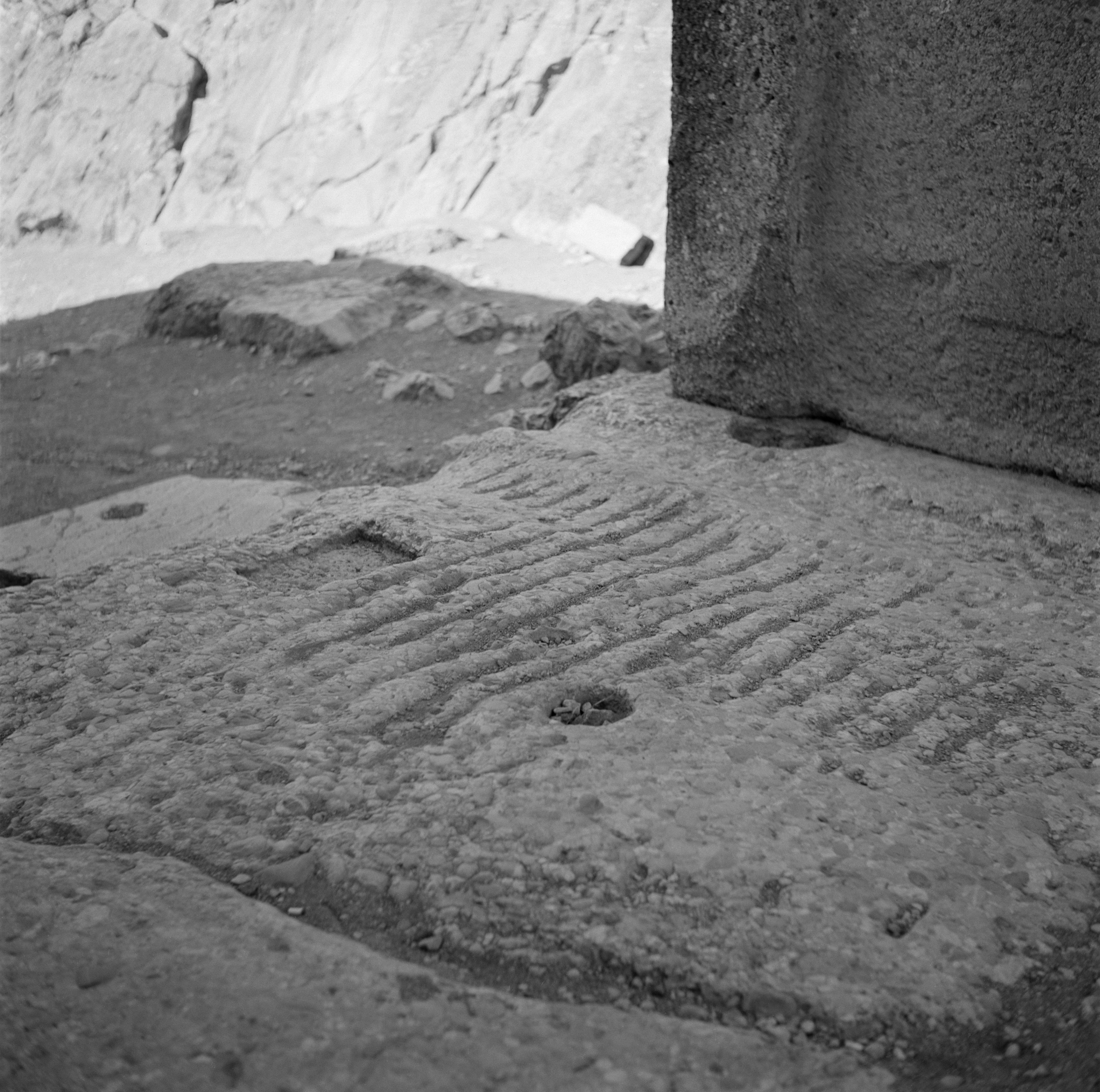 Lines craved in to stone on the ground