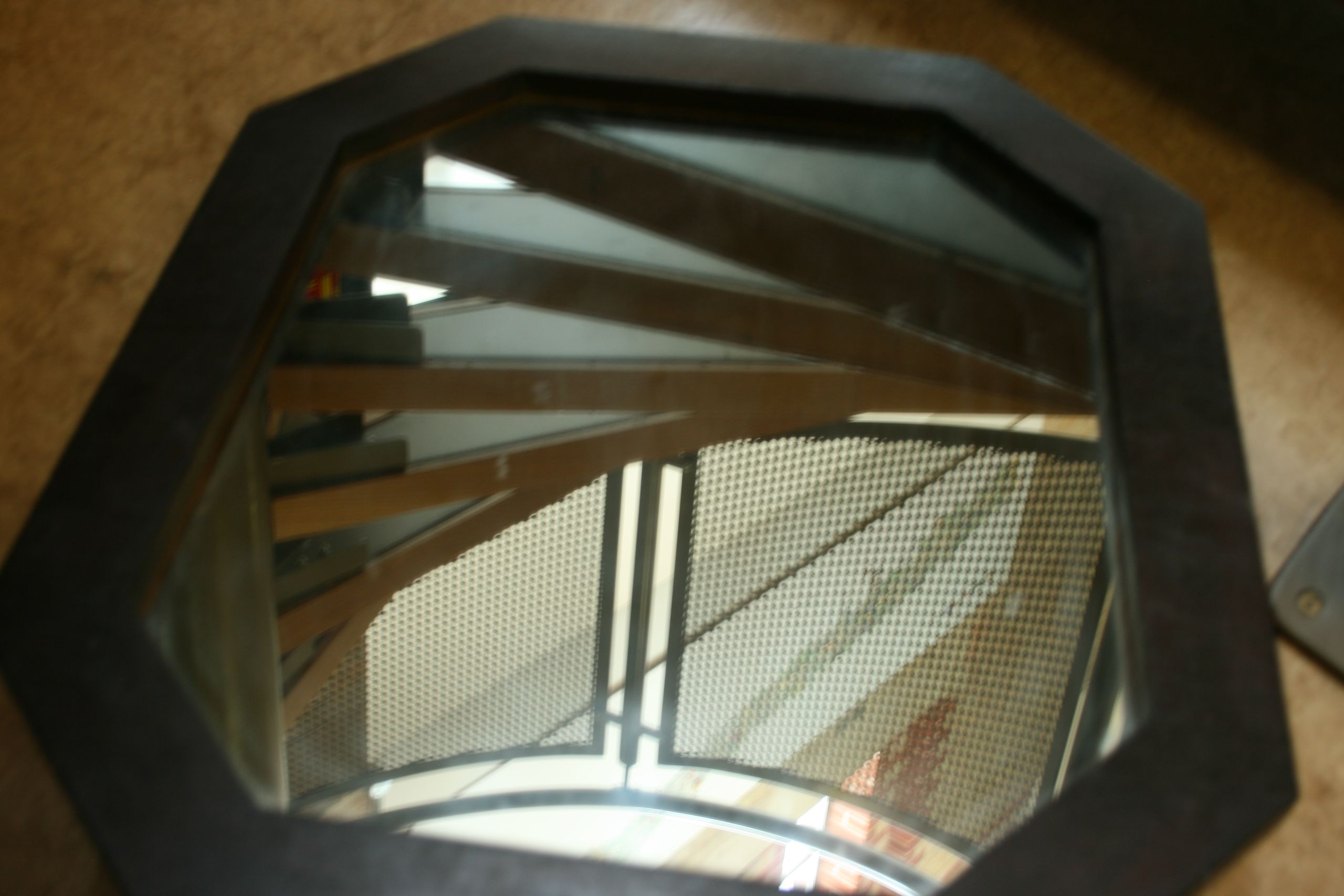 staircase reflected in a mirror