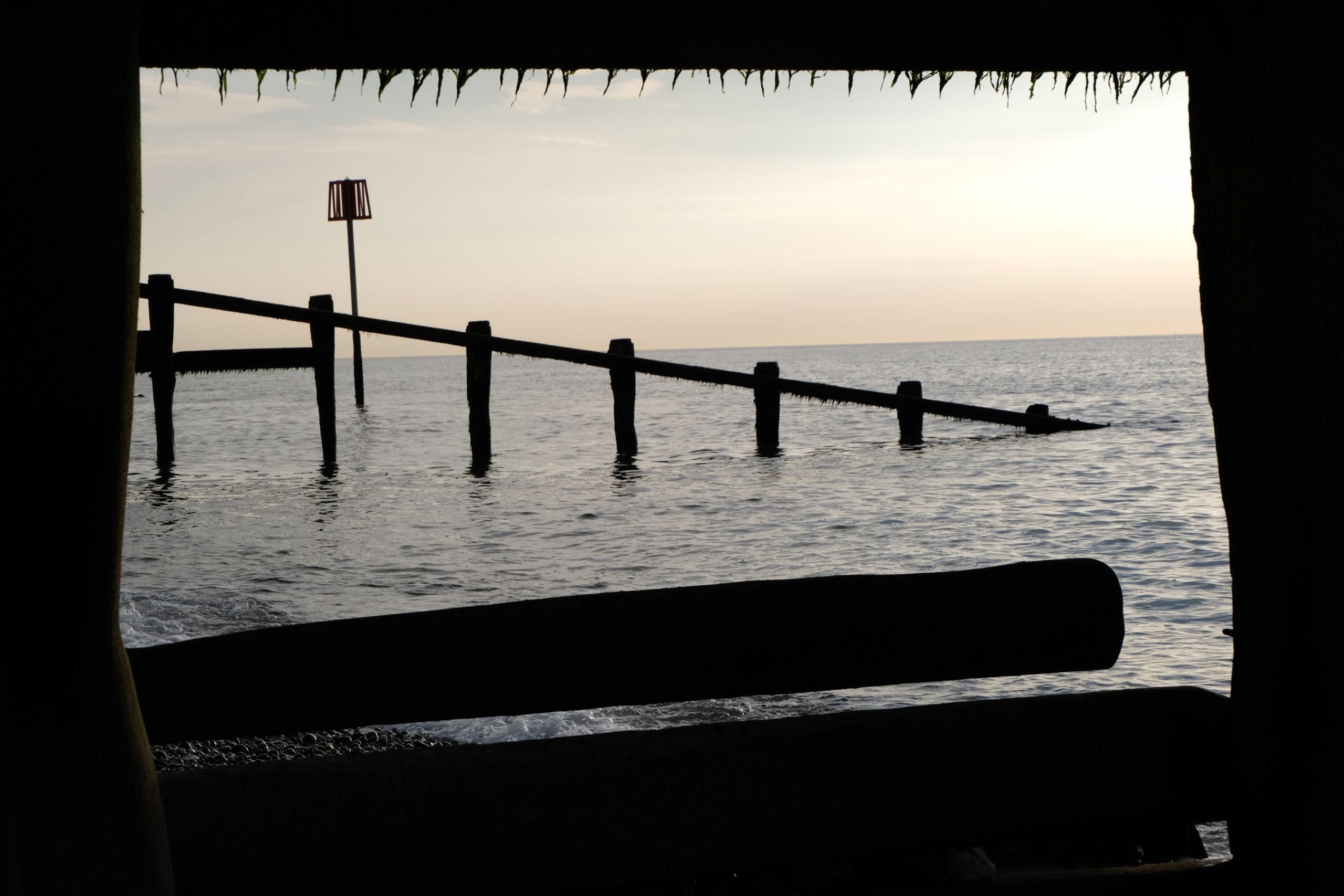 poles leading down to the sea